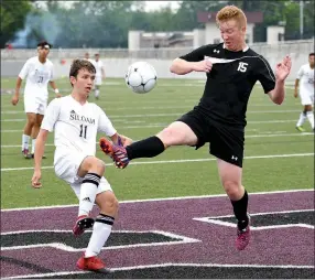  ?? Bud Sullins/Special to Siloam Sunday ?? Siloam Springs sophomore Eli Jackson, left, goes against Searcy’s Jessie Paslay on Friday in the 6A quarterfin­als at Panther Stadium. The Panthers defeated the Lions 6-0.