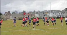  ??  ?? Arran hoists a player into the air to gain possession during a line-out.