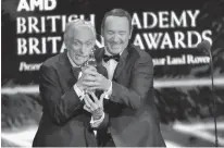  ?? Associated Press ?? Kevin Spacey, right, presents the award for excellence in television to Dick Van Dyke on Friday during the BAFTA Los Angeles Britannia Awards at the Beverly Hilton Hotel in Beverly Hills, Calif.