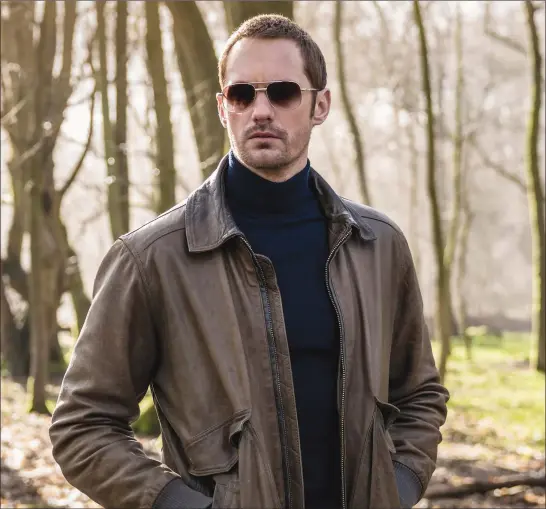  ??  ?? Alexander Skarsgård stars in “The Little Drummer Girl”