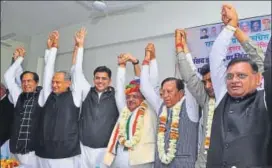  ?? HT PHOTO ?? Former CM Ashok Gehlot and state Congress president Sachin Pilot, along with the three winning candidates in the recent bypolls, at the party office in Jaipur on Wednesday.