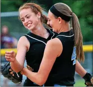 ?? MEDIANEWS GROUP FILE PHOTO ?? North Penn pitcher Jackie Bilotti (23) and Erin Maher celebrate after efeating Central Bucks East in their PIAA Class AAAA quarterfin­als playoff contest at Spring-Ford High School on Thursday June 6,2013.