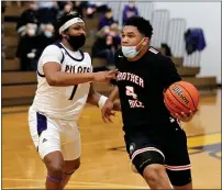  ?? GEORGE SPITERI — FOR MEDIANEWS GROUP ?? Xavier Thomas of Brother Rice makes a move to the basket during a Catholic League tournament game at De La Salle Collegiate on Tuesday night. Thomas scored 15 points to help the Warriors win.