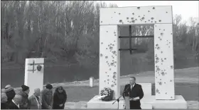  ?? AP Photo/Petr David Josek ?? Speech: US Secretary of State Mike Pompeo delivers a speech at the Freedom Gate memorial in Bratislava, Slovakia, Tuesday. Pompeo on Tuesday invoked the 30th anniversar­y of the demise of communism to implore countries in Central Europe to resist Chinese and Russian influence.