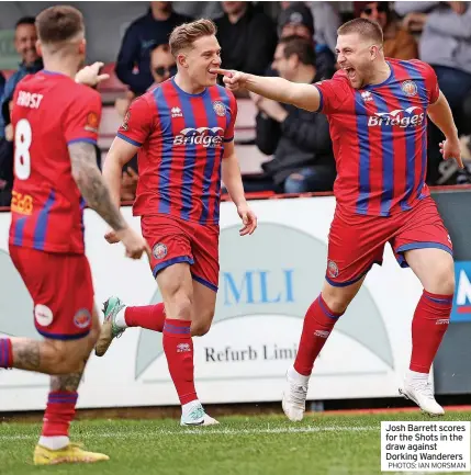  ?? PHOTOS: IAN MORSMAN ?? Josh Barrett scores for the Shots in the draw against Dorking Wanderers