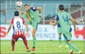  ??  ?? Players in action during ISL match between Bengaluru FC and ATK