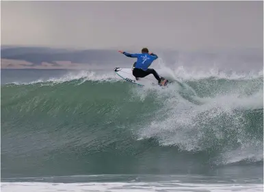  ??  ?? NOT A GREY SUIT IN SIGHT: Mick Fanning in action at the JBay Open last weekend. The Australian claimed the title, a year after his shark attack at the event.