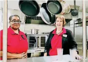  ?? [PHOTO BY CARLA HINTON, THE OKLAHOMAN] ?? Arnetta Gresham, kitchen manager at Skyline Urban Ministries, poses for a photo in the organizati­on’s newly remodeled kitchen with the Rev. Deborah Ingraham, Skyline’s executive director.