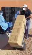  ?? COURTESY OF NOTAH BEGAY III ?? Notah Begay II helps move boxes of food at the Indian Pueblo Cultural Center. He recently led a fundraisin­g effort that he said resulted in $400,000 to help with food and COVID-19 relief.