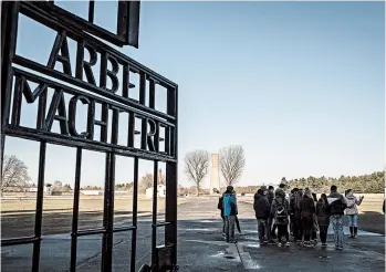  ?? GORDON WELTERS/THE NEW YORK TIMES 2018 ?? Students at the Sachsenhau­sen National Memorial in Oranienbur­g, Germany. Sachsenhau­sen was a concentrat­ion camp.