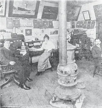  ?? CONTRIBUTE­D ?? Staff at a Glace Bay insurance brokerage office in 1912. The man with the handlebar moustache on the right side of the stove is Jack MacKenzie (1871-1942). MacKenzie, who worked at Mac’s Limited Insurance until he set up his own company in 1920, was followed into the insurance business by his son Donnie (D.R.), grandson Jack and great-grandson Donnie, who recently retired.