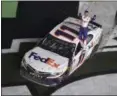  ?? PHELAN M. EBENHACK — THE ASSOCIATED PRESS ?? Denny Hamlin celebrates after winning the Daytona 500 on Feb. 17 at Daytona Internatio­nal Speedway.