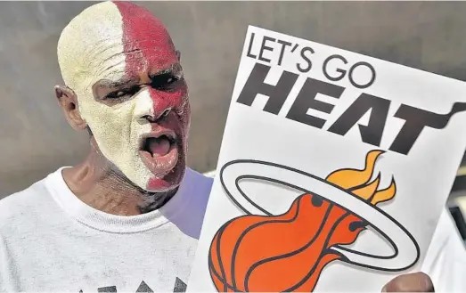  ?? MICHAEL LAUGHLIN/SOUTH FLORIDA SUN SENTINEL PHOTOS ?? There soon should be something for Heat fans to cheer about again … from afar. The league is working to establish a rigorous program to mitigate the risk related to COVID-19.