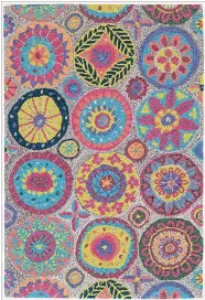  ?? ANNIE SELKE VIA AP ?? Annie Selke’s modern and playful Merry Go Round hooked rug, inspired by a piece of 1930s art she found in France.