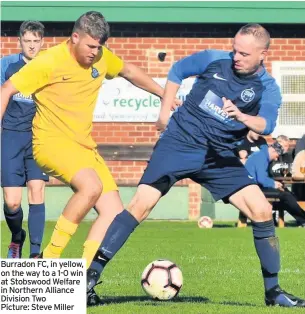  ??  ?? Burradon FC, in yellow, on the way to a 1-0 win at Stobswood Welfare in Northern Alliance Division Two Picture: Steve Miller