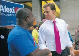  ?? E. JASON WAMBSGANS/CHICAGO TRIBUNE ?? Then-U.S. Senate candidate Alexi Giannoulia­s campaigns at the Millennium Metra station in 2010. He’s now seeking the Democratic nomination for Illinois secretary of state.