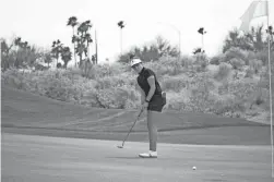  ?? BEN HARPRING/EPSON TOUR ?? Fatima Fernandez Cano watches a putt in the final round of the Carlisle Arizona Women’s Golf Classic at Longbow Golf Club in Mesa.