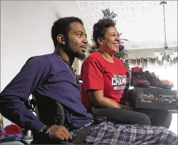  ?? AJC 2017 ?? Devon Gales and his mother, Tish, struggled for months to find a lot that was affordable and suitable to build a wheelchair-accessible house on. A breakthrou­gh came when former Bulldog Whit Marshall donated a lot in the subdivisio­n he’s developing.