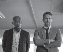  ?? Lionsgate ?? n Samuel L. Jackson, left, and Ryan Reynolds are shown in "The Hitman's Bodyguard."