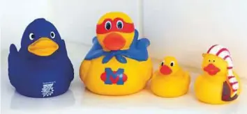  ?? AP ?? The canary yellow rubber ducks have long been popular bath toys for toddlers the world over.