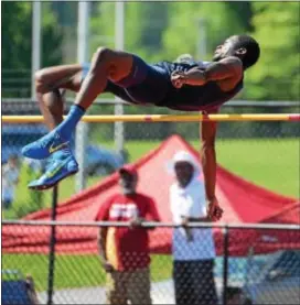  ?? DIGITAL FIRST MEDIA FILE ?? Dennis Manyeah of Penn Wood competes in the high jump May 19 at the District 1 track and field championsh­ips at Coatesvill­e.