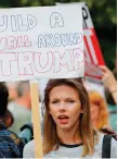  ??  ?? Protests against the visit of Donald Trump to Britain