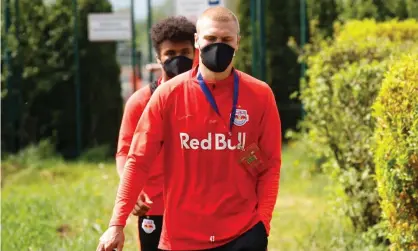  ??  ?? Red Bull Salzburg players wearing protective face masks for training on Tuesday. Photograph: Leonhard Föger/Reuters