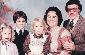  ?? SUBMITTED PHOTO ?? Catherine MacLellan, centre, sits on her mother Judith’s knee in this family portrait, taken in the 1980s. From left are Rachel (MacLellan) Evans, Phillip MacLellan and the late Gene MacLellan. Phillip is the sound engineer for Catherine’s new show.