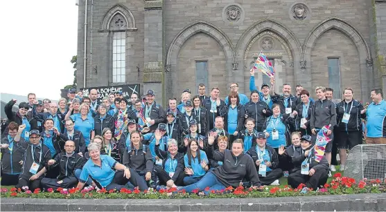  ??  ?? The Angus members of the Tayside Special Olympics team outside the Reid Hall in Forfar.