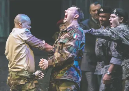  ?? CHRIS YOUNG ?? Michael Blake, left, as Othello and Gordon S. Miller as Iago with members of the company in the 2019 Stratford Festival production of Othello. Shakespear­e’s play presents challenges for modern audiences as the cultural reckoning of race inequality continues to spread worldwide.