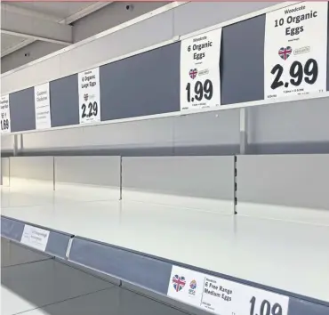  ?? ?? ↑ Empty egg shelves in a Lidl store