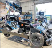  ?? PHOTO / SUPPLIED ?? Gerry Linklater’s 98V car, with the 81V of Max Holloway in the background at the SS Motorsport team’s garage.