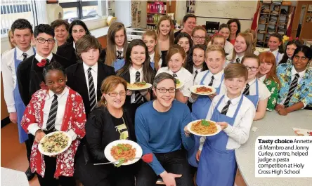  ??  ?? Tasty choiceanne­tte di Mambro and Jonny Curley, centre, helped judge a pasta competitio­n at Holy Cross High School