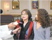  ?? OMAN NEWS AGENCY ?? Homa Hoodfar, left, a retired Canadian-Iranian professor, speaks to the media Monday in Muscat, Oman, after being released by Iranian authoritie­s on “humanitari­an grounds.”