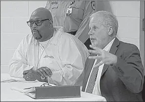  ?? Special to the Democrat-Gazette/KATV POOL PHOTO ?? Death-row inmate Stacey Johnson (left) sits with his attorney, Jeff Rosenzweig, as Rosenzweig addresses the Parole Board during a clemency hearing Friday at the Varner SuperMax Unit. Johnson is scheduled to be executed April 20.