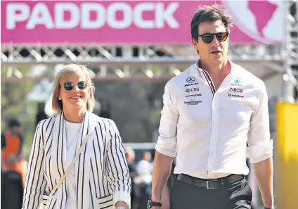  ?? ?? Power couple: Susie Wolff with husband Toto, the Mercedes team principal