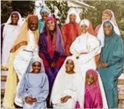  ??  ?? Members of the House of Prayer for All People cult pose in the hand-sewn garb they wore every day in this photo from the 1980s. The cult site was located outside Micanopy, Florida.