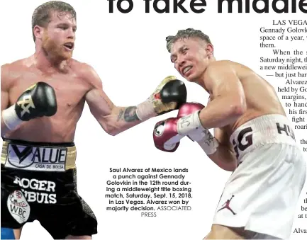  ?? ASSOCIATED PRESS ?? Saul Alvarez of Mexico lands a punch against Gennady Golovkin in the 12th round during a middleweig­ht title boxing match, Saturday, Sept. 15, 2018, in Las Vegas. Alvarez won by majority decision.