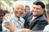  ??  ?? Mandela with Amichand Rajbansi.