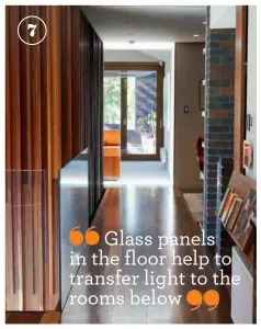  ??  ?? Glass panels in the floor help to transfer light to the rooms below