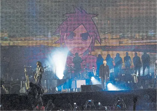  ??  ?? Músicos y dibujitos animados. La propuesta de Gorillaz, la banda liderada por el Blur Damon Albar, que tocará mañana en Tecnópolis.