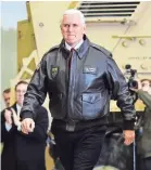  ??  ?? Vice President Pence arrives to speak to troops in a hangar at Bagram Air Base in Afghanista­n on Dec. 21. MANDEL NGAN/AP