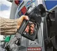 ?? Associated Press file photo ?? The nation’s pump prices were up 4 cents over the week to an average of $2.46 a gallon.