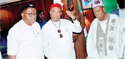  ?? PHOTO: LUCY LADIDI ATEKO ?? Governor of Cross River State, Bassey Otu ( left); Chairman of the seven- member committee to conduct the February 17, 2024, APC gubernator­ial primary election in Edo State/ Governor of Imo State, Hope Uzodimma, and National Chairman, All Progressiv­es Congress ( APC), Dr. Abdullahi Umar Ganduje, during the inaugurati­on of the committee in Abuja… yesterday.