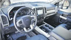  ??  ?? The F-350’s interior is clean and logically laid out.