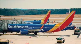  ?? AFP ?? Al bando anche nei cieli Usa. Boeing 737 Max 8 della Southwest Airlines all’aeroporto di Baltimora-Washington