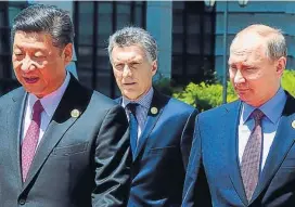  ?? (TÉLAM) ?? Mandatario­s. Xi Jinping, Mauricio Macri y Vladimir Putin.