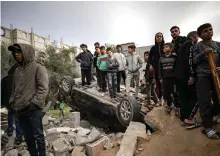  ?? EPA ?? Palestinia­n children inspect the rubble of a destroyed house in Rafah, near Gaza’s border with Egypt