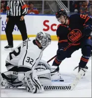  ?? JEFF MCINTOSH — THE CANADIAN PRESS VIA AP ?? Kings goalie Jonathan Quick turned in a vintage performanc­e in Game 7against the Oilers in Edmonton on Saturday.