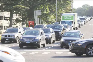  ?? Tyler Sizemore / Hearst Connecticu­t Media ?? Traffic backs up from the Interstate 95 Exit 3 southbound ramp during the morning rush hour on Wednesday.